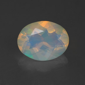 Ópalo multicolor natural de 1,07 ct, corte óvalo, transparente