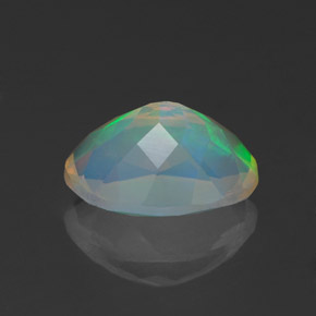 Ópalo multicolor natural de 1,07 ct, corte óvalo, transparente
