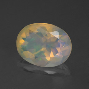 Ópalo multicolor natural de 1,12 ct, corte óvalo, transparente