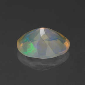 Ópalo multicolor natural de 1,12 ct, corte óvalo, transparente