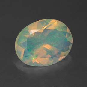 Ópalo multicolor natural de 1,38 ct, corte óvalo, transparente
