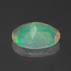Ópalo multicolor natural de 1,38 ct, corte óvalo, transparente
