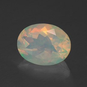 Ópalo multicolor natural de 1,33 ct, corte óvalo, transparente