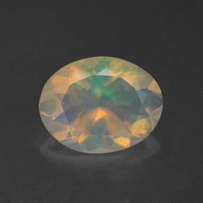 Ópalo multicolor natural de 1,24 ct, corte óvalo, transparente