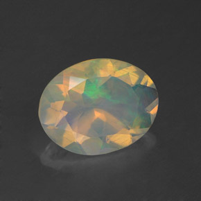Ópalo multicolor natural de 1,24 ct, corte óvalo, transparente