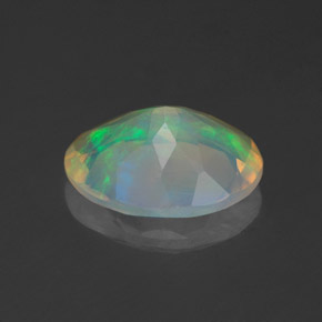 Ópalo multicolor natural de 1,24 ct, corte óvalo, transparente