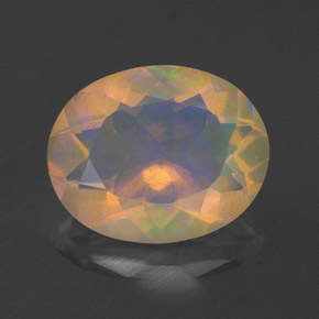 Ópalo multicolor natural de 1,76 ct, corte óvalo, transparente