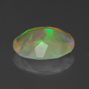 Ópalo multicolor natural de 1,59 ct, corte óvalo, transparente