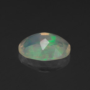 Ópalo multicolor natural de 1,14 ct, corte óvalo, transparente