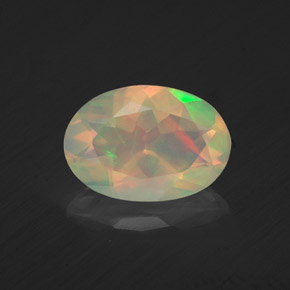 Ópalo multicolor natural de 1,09 ct, corte óvalo, transparente
