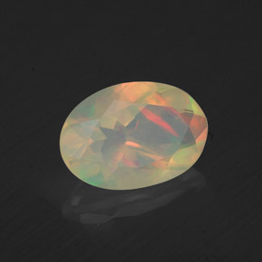 Ópalo multicolor natural de 1,09 ct, corte óvalo, transparente