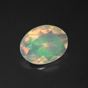 Ópalo multicolor natural de 1,10 ct, corte óvalo, transparente