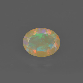 Ópalo multicolor natural de 1,05 ct, corte óvalo, transparente