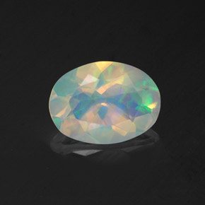 Ópalo multicolor natural de 0,96 ct, corte óvalo, transparente