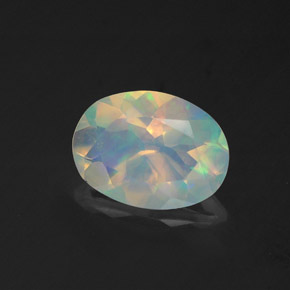 Ópalo multicolor natural de 0,96 ct, corte óvalo, transparente