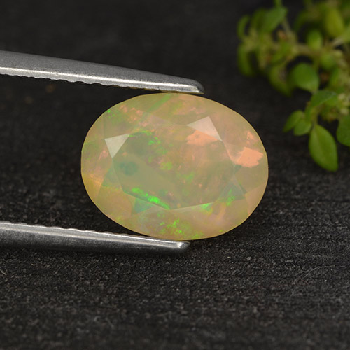Ópalo multicolor natural de 1,14 ct, corte óvalo, translúcido