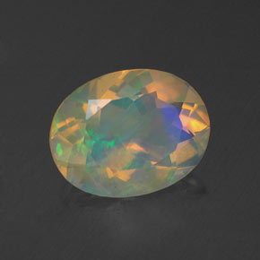 Ópalo multicolor natural de 1,23 ct, corte óvalo, transparente