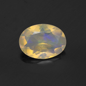Ópalo multicolor natural de 0,74 ct, corte óvalo, transparente