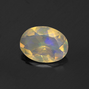 Ópalo multicolor natural de 0,74 ct, corte óvalo, transparente