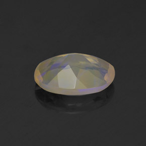 Ópalo multicolor natural de 0,74 ct, corte óvalo, transparente