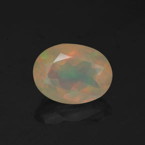 Ópalo multicolor natural de 0,97 ct, corte óvalo, transparente