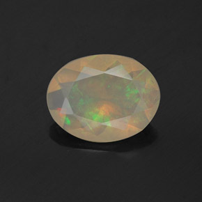 Ópalo multicolor natural de 0,81 ct, corte óvalo, transparente