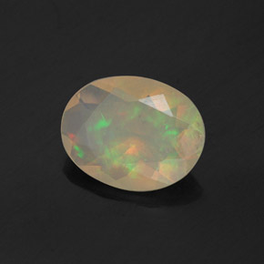 Ópalo multicolor natural de 0,81 ct, corte óvalo, transparente