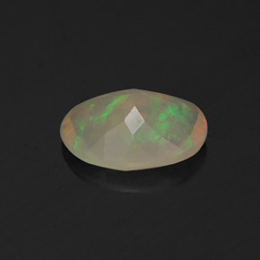 Ópalo multicolor natural de 0,81 ct, corte óvalo, transparente