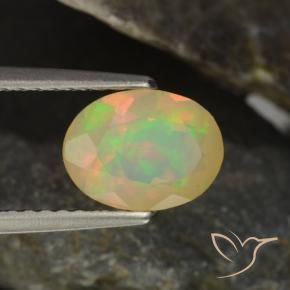 Ópalo multicolor natural de 0,94 ct, corte óvalo, transparente