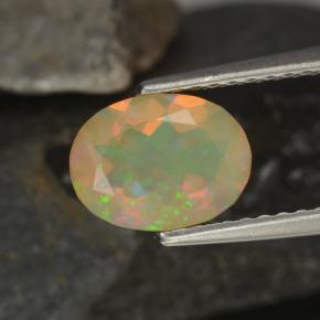Ópalo multicolor natural de 0,92 ct, corte óvalo, transparente