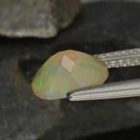 Ópalo multicolor natural de 0,92 ct, corte óvalo, transparente