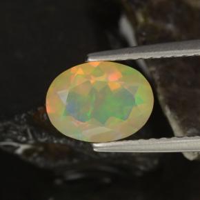 Ópalo multicolor natural de 0,88 ct, corte óvalo, transparente