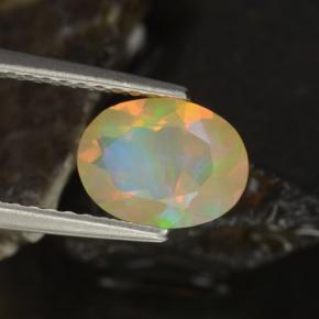 Ópalo multicolor natural de 0,88 ct, corte óvalo, transparente