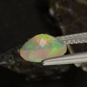 Ópalo multicolor natural de 0,88 ct, corte óvalo, transparente