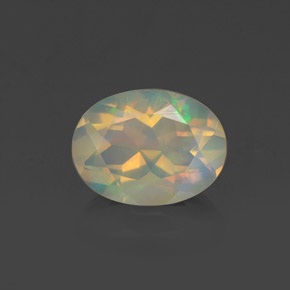Ópalo multicolor natural de 0,98 ct, corte óvalo, transparente