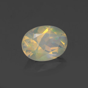 Ópalo multicolor natural de 0,98 ct, corte óvalo, transparente