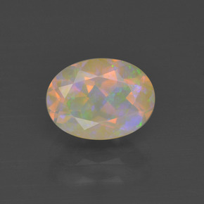 Ópalo multicolor natural de 1,06 ct, corte óvalo, transparente