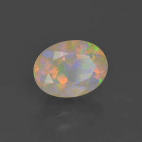 Ópalo multicolor natural de 1,06 ct, corte óvalo, transparente