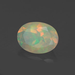 Ópalo multicolor natural de 0,92 ct, corte óvalo, transparente