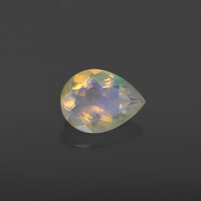 Ópalo multicolor natural de 0,74 ct, en forma de pera, transparente