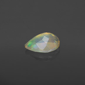 Ópalo multicolor natural de 0,74 ct, en forma de pera, transparente