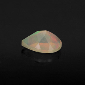 Ópalo multicolor natural de 0,51 ct, en forma de pera, transparente