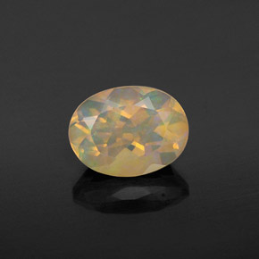 Ópalo multicolor natural de 0,92 ct, corte óvalo, transparente