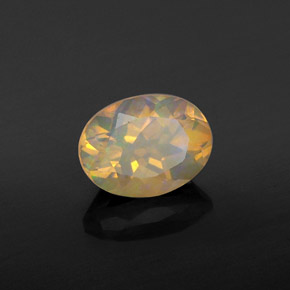 Ópalo multicolor natural de 0,92 ct, corte óvalo, transparente