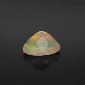 Ópalo multicolor natural de 0,92 ct, corte óvalo, transparente