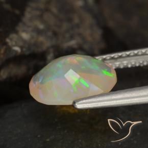 Ópalo Multicolor natural de 1.09 ct, Ovalada, Transparente