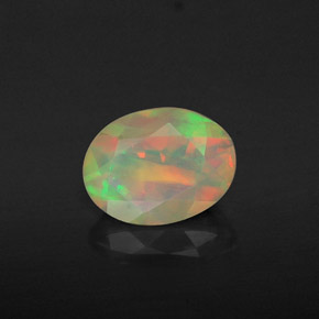 Ópalo multicolor natural de 1,06 ct, corte óvalo, transparente