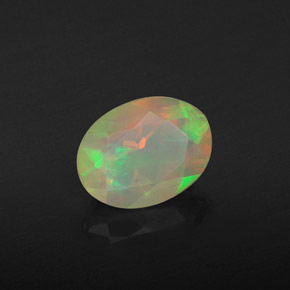 Ópalo multicolor natural de 1,06 ct, corte óvalo, transparente