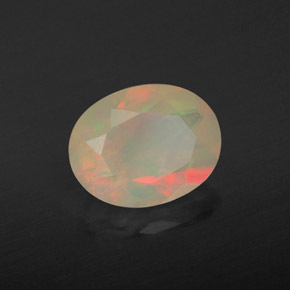 Ópalo multicolor natural de 1,29 ct, corte óvalo, transparente