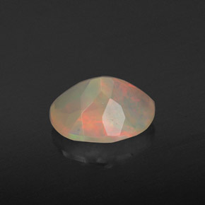 Ópalo multicolor natural de 1,29 ct, corte óvalo, transparente